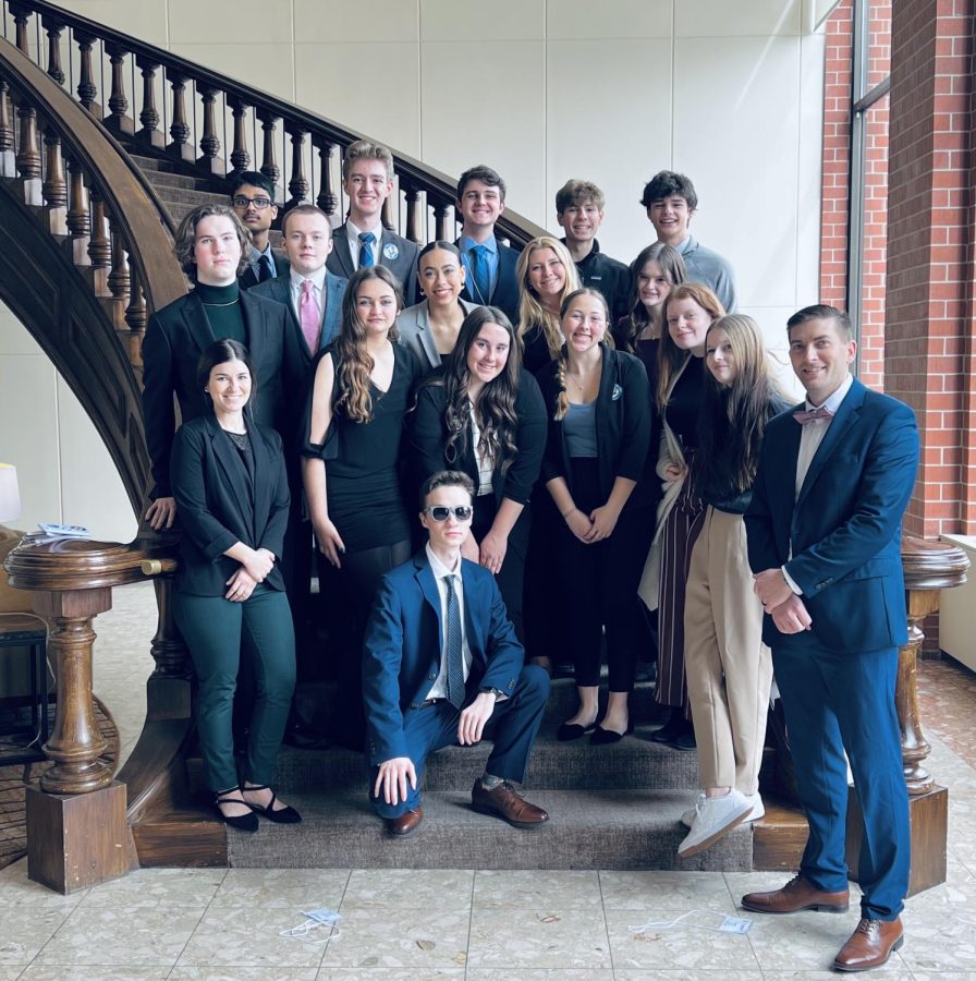 The+DECA+team+poses+for+a+photo+before+the+competition+begins+on+March+17.+12+students+will+be+representing+Millard+West+at+the+national+competition+in+Atlanta.+%E2%80%9CThe+team+has+been+preparing+for+the+State+competition+leading+back+all+the+way+to+the+beginning+of+the+year%2C%E2%80%9D+DECA+president+senior+Natanael+Ray+said.+%E2%80%9C+Through+events+like+the+First-Timers+Competition+and+our+own+internal+practice+competition%2C+members+have+been+getting+used+to+the+structure+of+what+a+competitive+DECA+event+looks+like.%E2%80%9D%0A