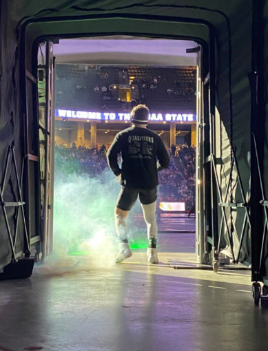 Sophomore Noah Blair comes out of the tunnel to compete in the State meet. Blair wrestled through four different matches en route to capturing the 182 pound weight class state title. “Yes, absolutely I was confident,” Blair said. “As a freshman I got third at the state tournament and won districts. Im always excited to compete and its a blessing to have the opportunity to even walk or breathe right.”