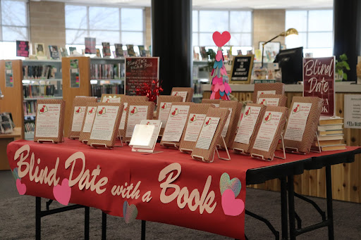 The library put up their blind date with a book display for the month of February. The table presented a creative opportunity to get more of the Millard West community engaged with reading.“It was very interesting that the first few days of the display being up, we had groups of students gather at the table all together,” teacher librarian Mindy Jorgensen said. “It was really nice to see numerous students interested at the same time, all talking about the books and giving each other advice on which one to pick. It also cleared out our table on the first afternoon. I think we had 14 books go out after school the first day we put out the display. All the students who stopped at the table seemed interested and very willing to give one of the books a try, even though it was sight unseen, with only a few details to go by to make their choice.”