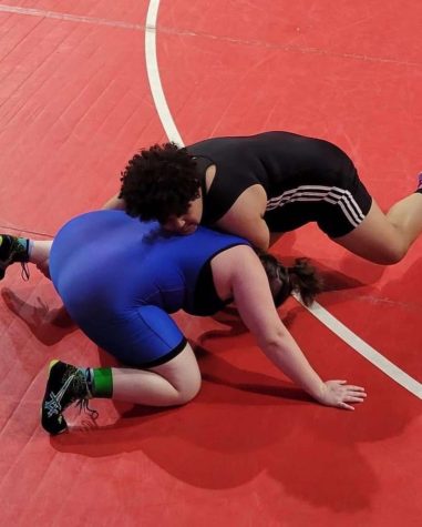 Freshman Amaya McLauren works to get behind her opponent during her second match.