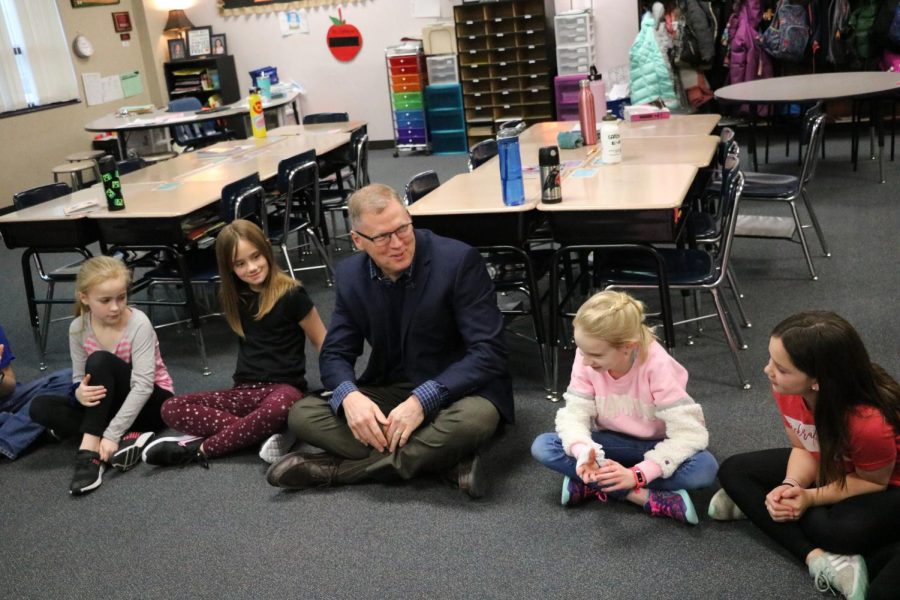 Dr.+Jim+Sutfin+visits+with+students+at+Reader+Elementary.+Sutfin+has+worked+in+Millard+Public+Schools+for+27+years+and+plans+to+retire+at+the+end+of+this+school+year.+%E2%80%9CI+came+here+the+first+year+Millard+West+opened+and+I+loved+it%2C%E2%80%9D+Sutfin+said.+%E2%80%9CIn+every+stage+of+my+career+there+was+always+someone+motivating+me+to+take+it+a+step+further.+I+am+so+grateful+for+my+time+here+in+Millard+and+I+will+never+forget+it.%E2%80%9D