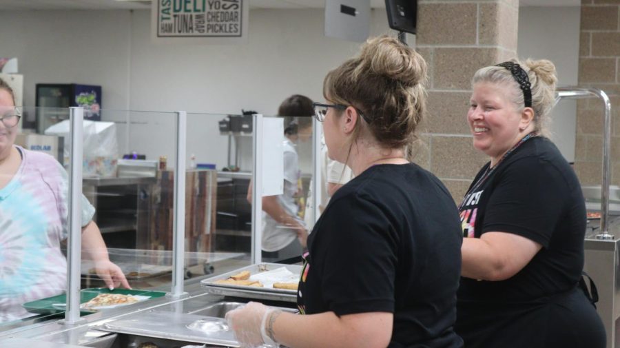 Annin, Mitchell, and other kitchen staff members enjoy talking to the students as they serve them food, learning what they do and dont like.