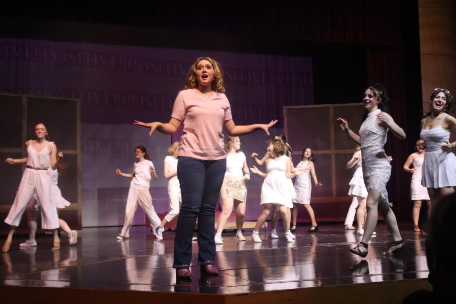 Sophomore Madalynn Johnson performing positive in Legally Blonde the musical.