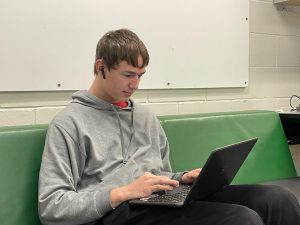 Junior Nathan Delaney likes to listen to music during work time. Studies suggest that listening to music can increase your focus while studying and increase productivity.