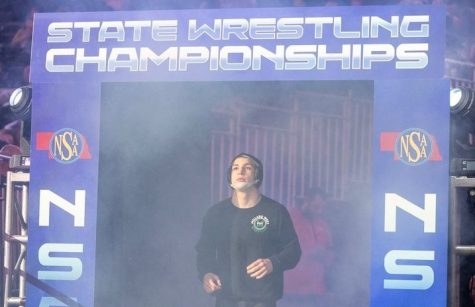 Junior Noah Blair enters the mat to wrestle. Blair had won the A182 State Championship the year before and was getting ready to do the same again. “I prepare for State the same way I do any other tournament,” Blair said. “Its more than just what you do on the mat, its eating habits, sleep schedule, recovery, et cetera.”