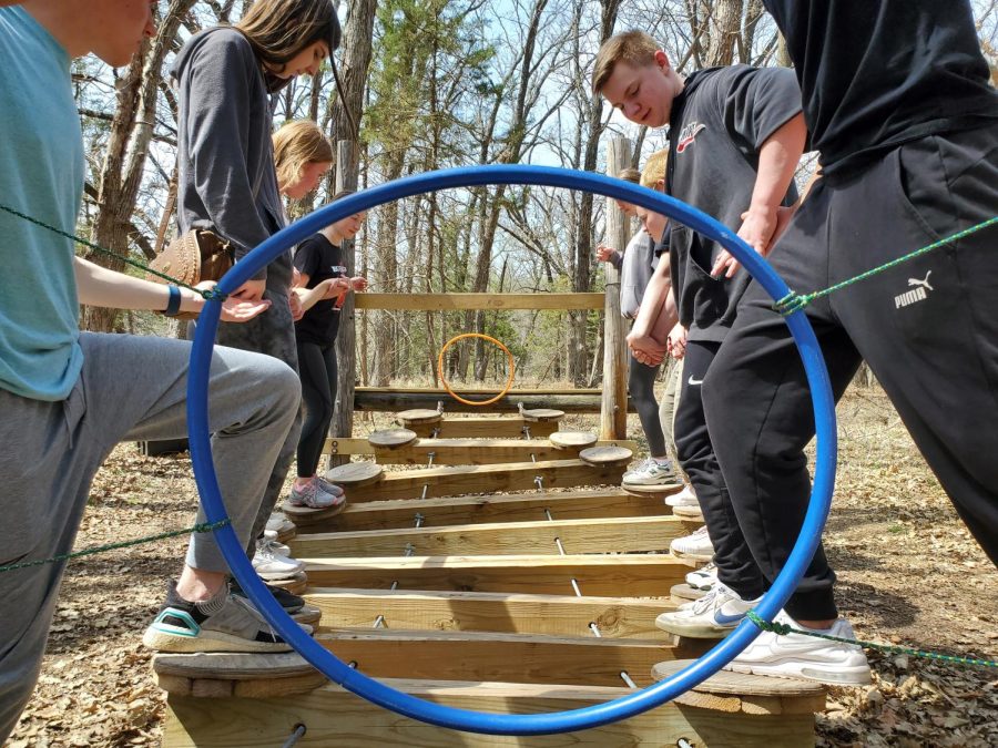 Millard West and German Exchange Students played a game called the xylophone challenge where they had to balance across a wobbly bridge. One of the many trips these students went on was to the Camp Carol Joy Holling where they used teamwork to complete many different challenges. “We got on a swing and had to work together to make it across to the other side,” junior Katie Rinell said. “We had to use teamwork to get across the ropes course.”
