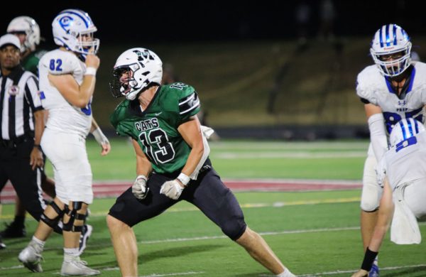 Senior linebacker Easton Behrens celebrates after a big hit on Prep junior quarterback Tony Coniglio. Behrens and the Wildcat defense hit the Jays behind the line of scrimmage over ten times, and had a sack himself. “Coming into the game I wanted to blitz more,” Behrens said. “With the way the game went, I was happy I got the nod to rush after the quarterback more and more, and hope I can do it some more in future weeks.”
