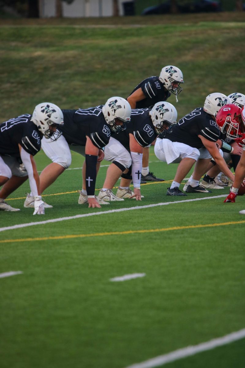 Wyatt Goodlett, #60, and his teammates lined up against Millard South in the first game of the year. It was Wyatt Goodlett’s first time back playing on the field after 11 months. “Although we lost this game which wasn’t the greatest feeling, I was happy to be playing again,” Wyatt Goodlett said. “I felt more comfortable with the offense and my teammates, and being a senior makes me want to play harder.”
