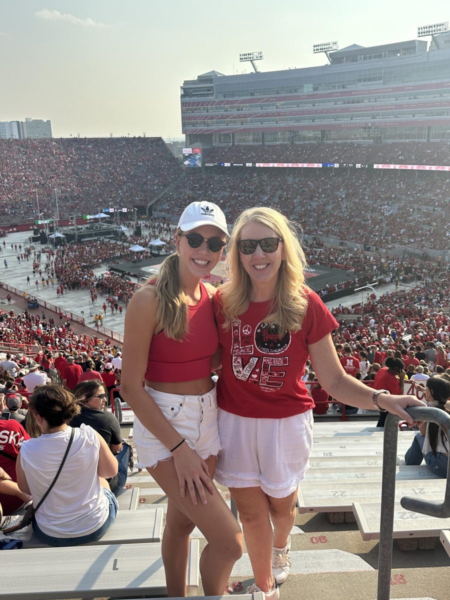 Watching+the+stands+fill+up+for+Volleyball+Day%2C+senior+Kaelin+Pribyl+stopped+to+snap+a+pic+before+the+stadium+got+too+busy.+On+Aug.+30%2C+Nebraska+beat+the+world+record+with+an+attendance+of+92%2C003+people.+These+types+of+moments+help+bring+more+attention+to+womens+sports%2C+which+allows+them+to+receive+the+respect+they+deserved+a+long+time+ago%2C+Pribyl+said.+The+video+tributes+were+what+I+enjoyed+most+about+the+game+because+they+were+videos+of+players+talking+about+what+this+opportunity+means+for+them+personally+and+how+it+impacts+sports+all+together.
