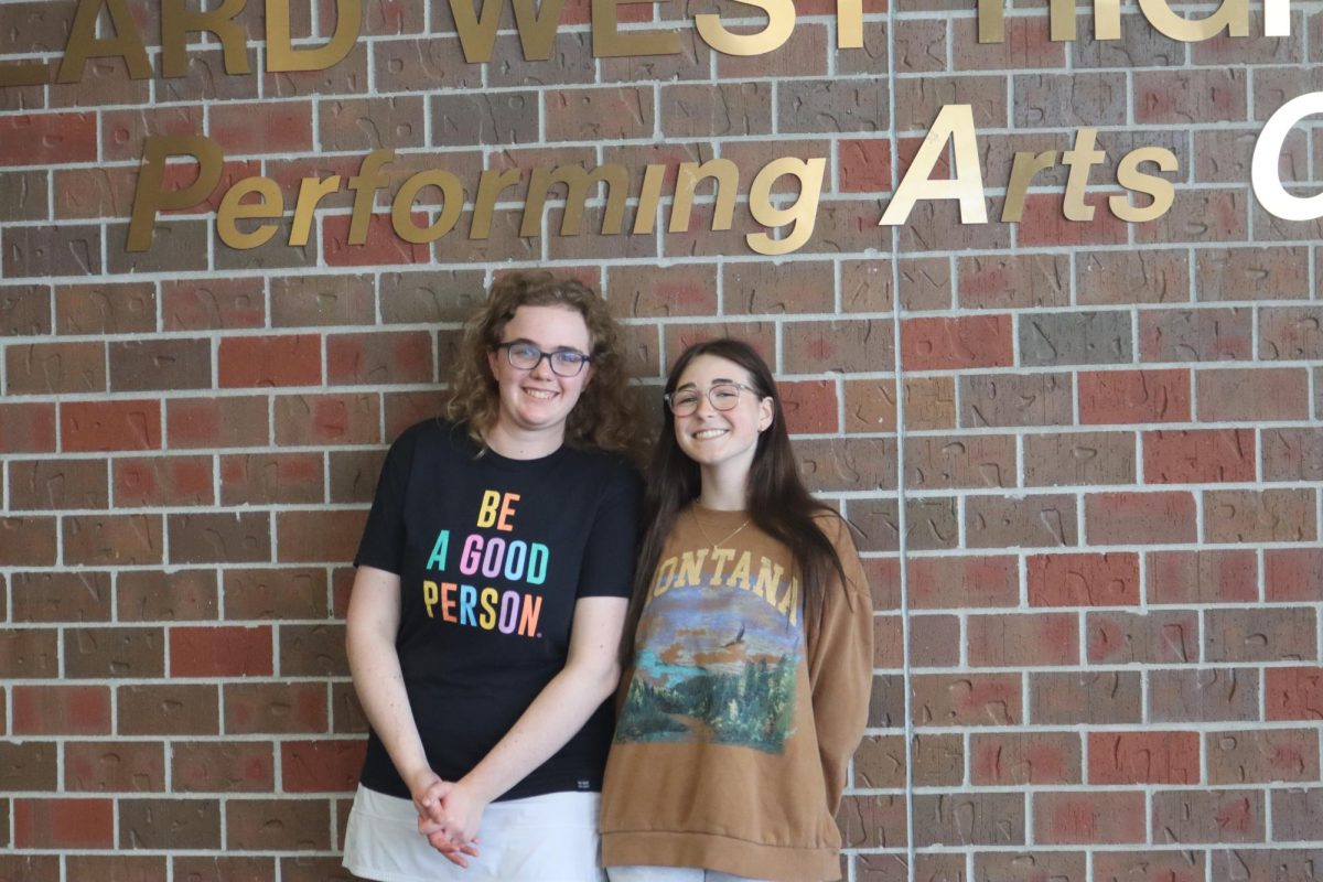 Actors Nina Mills (left) and Sophia Bartlett (right) pose for a photo in the auditorium lobby. The story is more emotional than youd think, Mills said. Make sure to come see it in November!