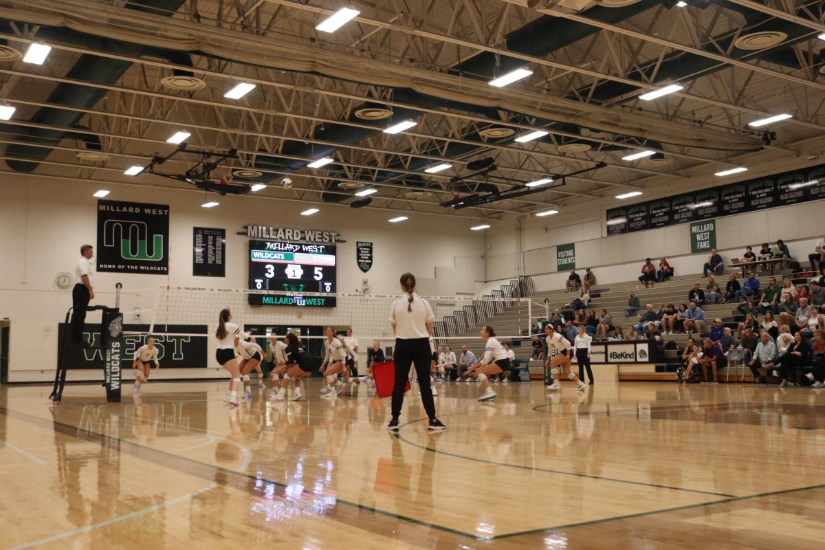 Kerkman+and+Pockharel+are+looking+up+at+the+ball+with+Kerkman+getting+ready+to+spike+the+ball..+Elkhorn+South+had+hit+it+over+but+it+got+saved.+From+that%2C+Pockharel+set+the+sike+up.+%E2%80%9CI+think+the+win+was+something+that+we+really+needed.+We+had+been+losing+for+a+while%2C%E2%80%9D+Kerkman+said.+%E2%80%9C+We+had+played+them+before+and+last+time+they+beat+us+and+we+had+to+beat+them+this+time.%E2%80%9D