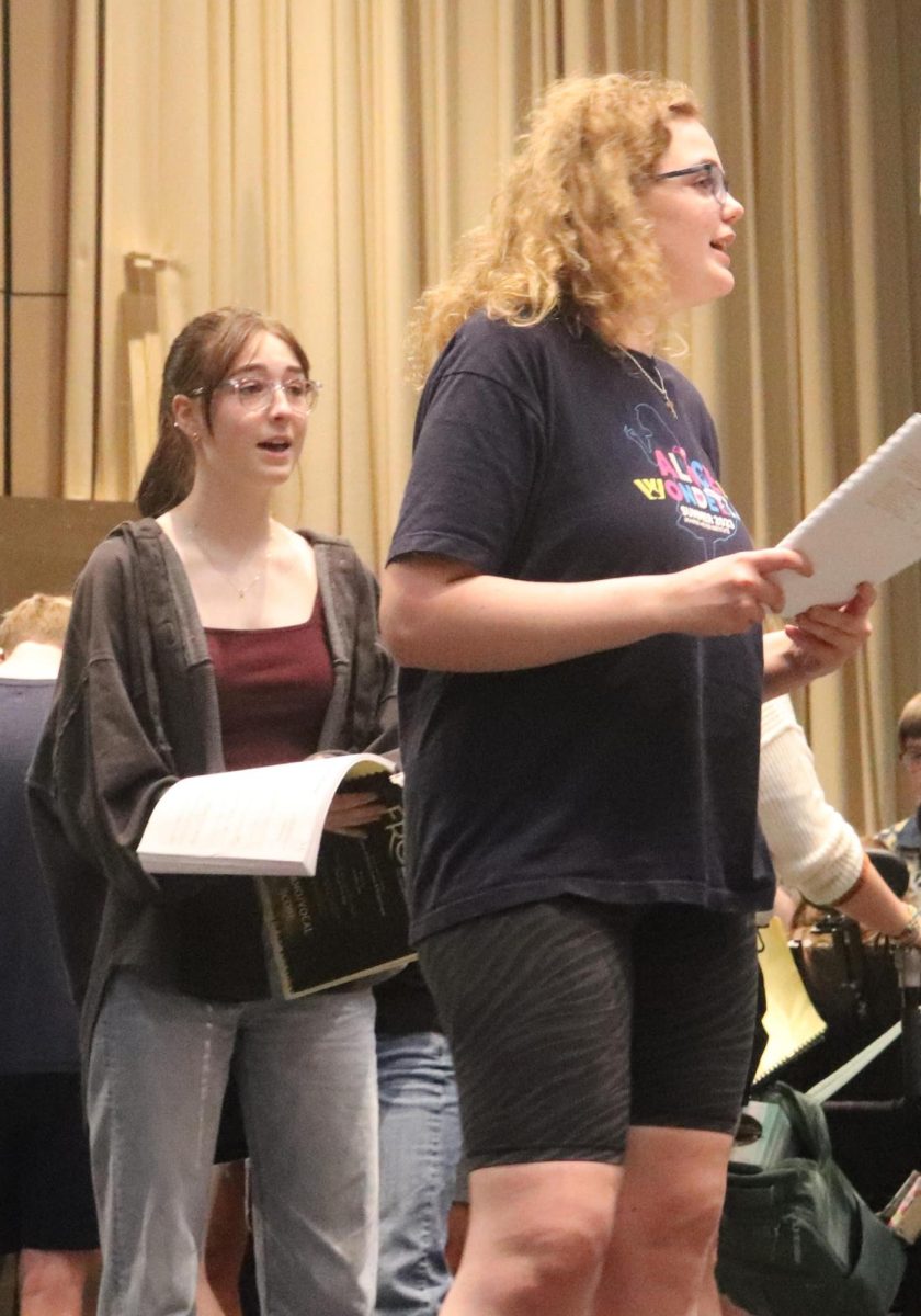 Actors Sophia Bartlett (left) and Nina Mills (right) practice their lines on stage. Its a very fun story, Mills said. Even if it can get a bit sad. 