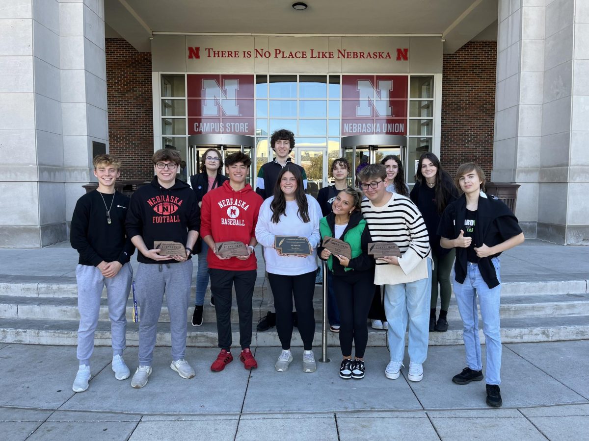 Advanced Journalism, Broadcast Journalism and Yearbook students pose outside the UNL Union after receiving four Cornhuskers (Catalyst print, Catalyst online, MWHS Wildcat News broadcast and Prowler yearbook). This is the highest award given for scholastic journalism in Nebraska. The Prowler yearbook was also inducted into the Cornhusker Hall of Fame.