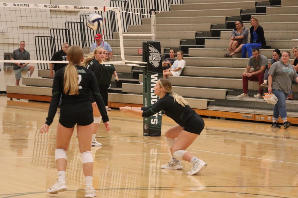 In the first match of the season, sophomore Aubrey Pinkston passes the ball the sophomore Evie Laferla to spike it over the net. All the players competed in a scrimmage starting with the reserve team against the freshman team, and Pinkston played as a setter to try to win the victory. “Volleyball brings me excitement during the games or when we score,” Pinkston said. “On the downside, I may feel pressured and nervous.”