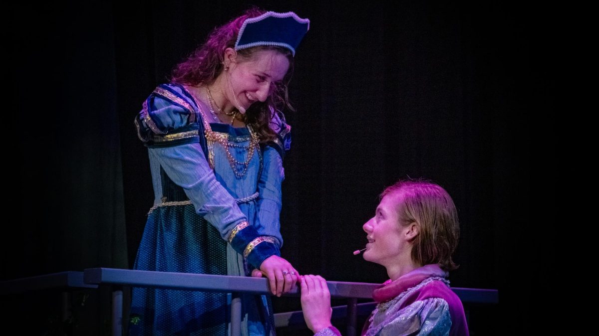 On stage, Juliet’s actor Lily Lane and Romeo’s actor Henry Hudson talk and flirt at Juliet’s balcony. At the Aug. 29 performance, the cast and crew had rehearsed this play many times already, with the hopes of portraying a heartfelt story, this was their first time performing for a packed theater. “Stay but a little, I will come again,” Lane (Juliet) said. “Three words, dear Romeo, and good night indeed.”