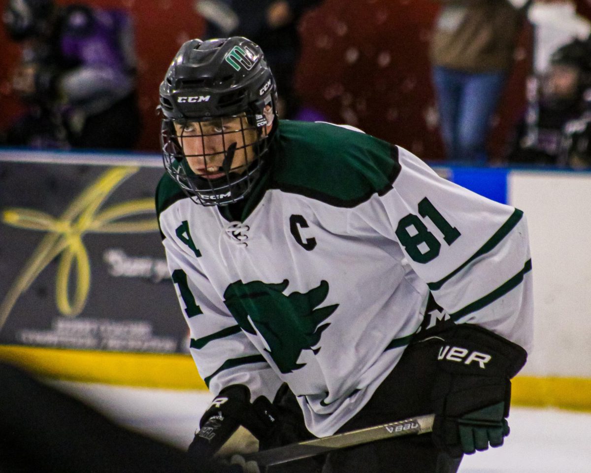 Awaiting the faceoff, Senior Captain Reece Wilson prepares for the puck to drop. Tri-City won 4-1.