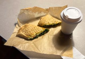 Cafe Botanica is a locally sourced, healthy option that can be a substitute for going to a fast food restaurant. In the image I'm eating a signature egg and cheese wrap along with a pumpkin spice latte.
