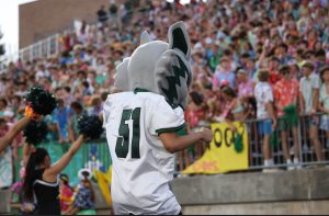 Hanging out on the field, junior Zachariah Skeikh pumps up the crowd during the game. He gets to join his fellow Cats as our football players take the field. “My favorite thing about it would be dancing or seeing the game up close,” junior Zachariah Skeikh said. “Also, hanging out with the cheerleaders and dance team is fun.”
                                                                     
