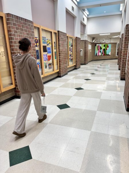 Walking the halls, sophomore Kyla Riveland uses the new pass system that was put in place. She had to carry the pass out in the open as she walked to the STS bathrooms. “I really haven't had enough experience with it,” Riveland said. “As of right now I just think it’s a lot of unneeded passes and that this process could be a lot more simple.”
