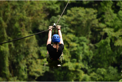 Ziplining through the Costa Rican trees, sophomore Aubrey Kirk enjoys many tourist attractions on her six-day vacation. Along with the humid air, Kirk was amused by the many astonishing opportunities the country had to offer. “We found that there were more opportunities to look at wildlife than other places,” Kirk said. “My favorite part was definitely when we fed the monkeys on the beach.”