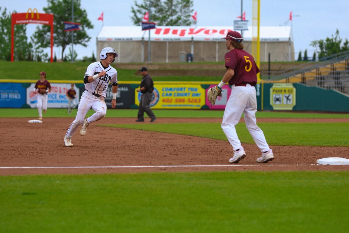Zooming towards home, Junior Jake Daniel sprints home to score the teams first run of the game. “It felt great to finally get on the board after we were struggling to get runs in when bases were loaded,” Daniel Said. “We needed a spark to get the team going even though it was late in the game.”