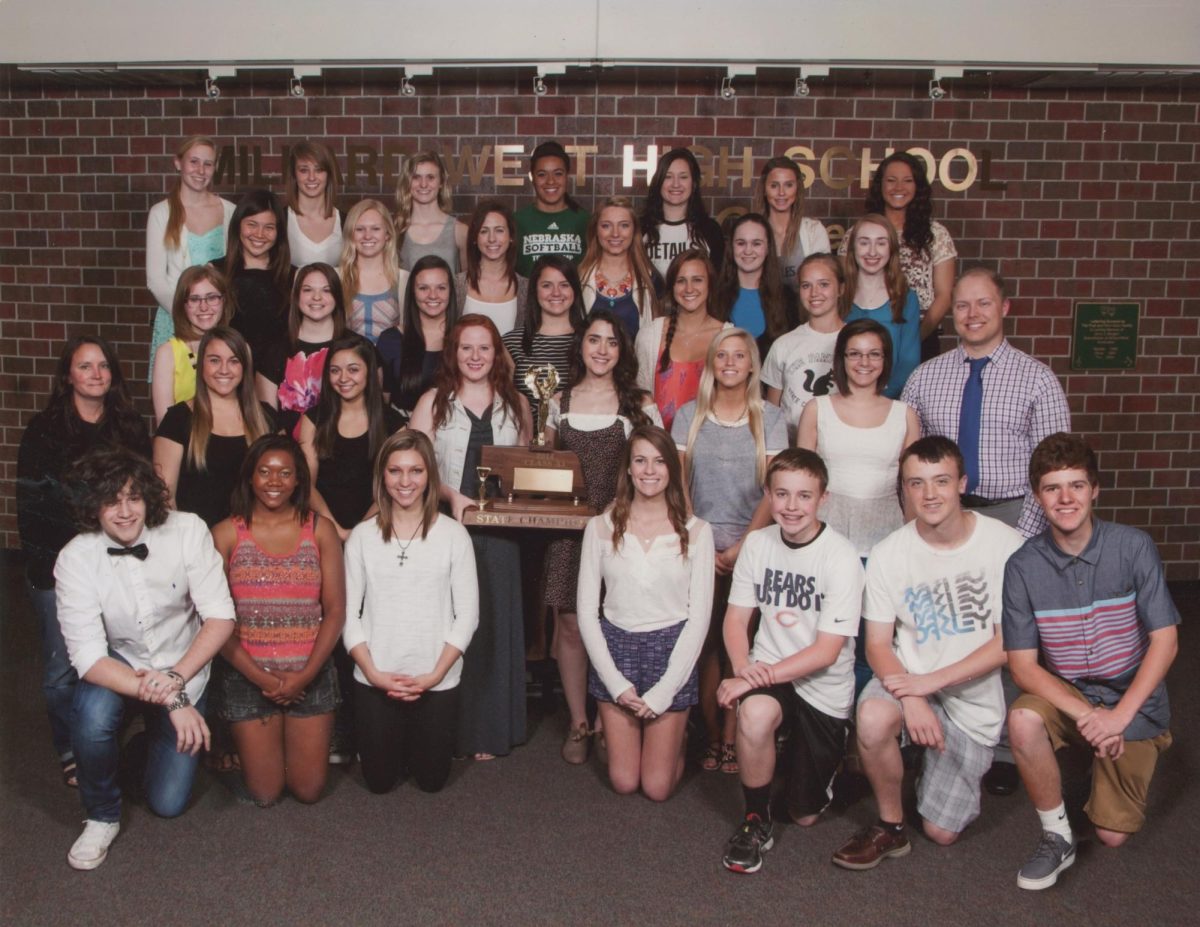 The 2014 journalism classes gather for a photo following their state championship advised by Lisa Lukecart and Mark Hilburn. Millard West dominated the Class A competition, winning the title by 42 points. “I've seen students grow tremendously over the years of teaching them,” Hilburn said. “For some, it's just gaining the confidence to allow others to edit and view their work, and for others, it's getting in front of the camera, behind the microphone or taking on leadership roles on a publication staff. Even if students aren't interested in going on to study journalism in college or pursue this as a career, the skills they learn here will benefit them in whatever they do. I've had many former students return or reach out thanking me as they felt more prepared than many of their college peers during their freshman and sophomore years because of the skills they learned at West with writing, editing, broadcasting, etc.”
Photo courtesy of Mark Hilburn.