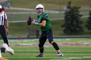 Catching the snap cleanly, senior David James Schiemann searches for an open teammate to pass to. Schiemann played a handful of different sports in his Wildcat career and got the opportunity to thrive in many ways on the field, court, or lanes. “Throughout my high school career, I've played football all four years, basketball for three years, baseball for two years, track for a year, and bowling for my senior year,” Schiemann said. “My coaches and family helped push me through all the seasons and helped me become the athlete I am today.”
