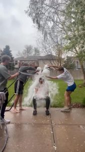 Feeling the freezing water, senior Ethan Cole partakes in the USC Speak Your Mind Challenge with his friends. The ALS Ice Bucket Challenge inspired this challenge in 2014. “I did the Ice bucket Challenge to raise awareness for mental health,” Cole said. “I hoped my participation in the challenge helped inform a few more people on the importance of speaking up for people dealing with mental health problems around us.”