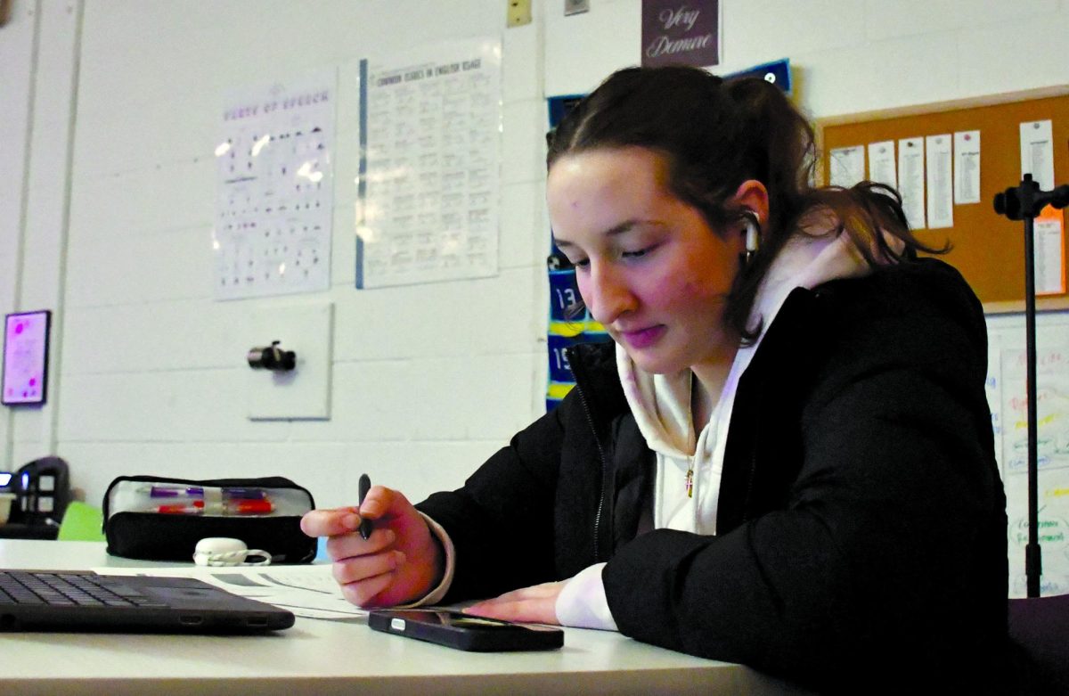 Hard at work, senior Jocelyn Park work away at her homework for AP Capstone. This program made by the College board, helps students to gain skills that can be used in College.