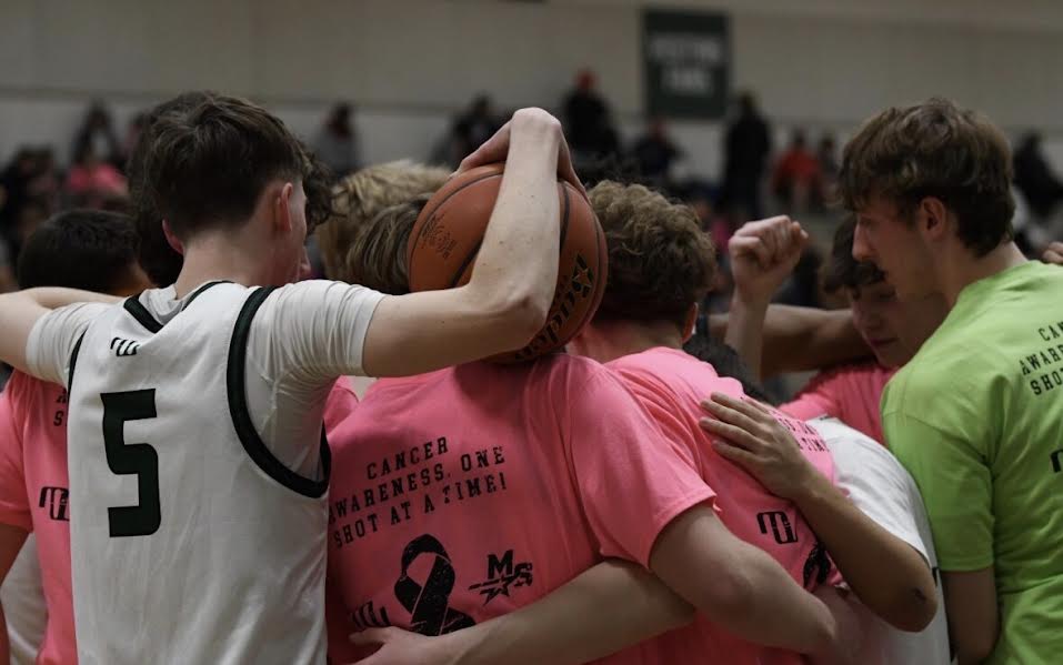 Each player chose a color shirt to show their support for a different type of cancer. ”I chose to wear pink for my grandma,” Junior Jameson Malik said. “She beat breast cancer, and I wanted to wear pink to show my support for her and express how proud I am that she beat it."