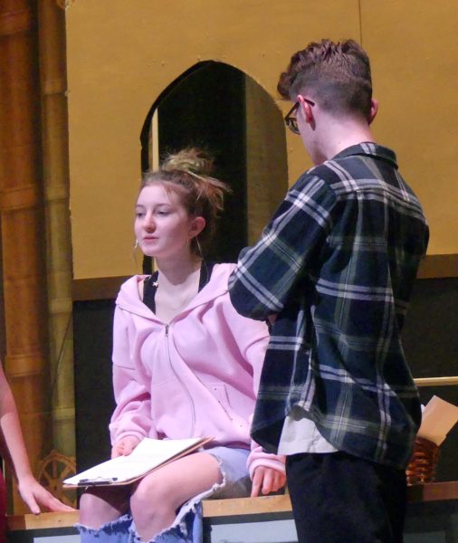 Anna Walker and Maddox Larison run lines during a rehearsal for the spring production of 'Radium Girls." Walker takes on the role of Grace Fryer, a factor worker fighting for her day in court. 